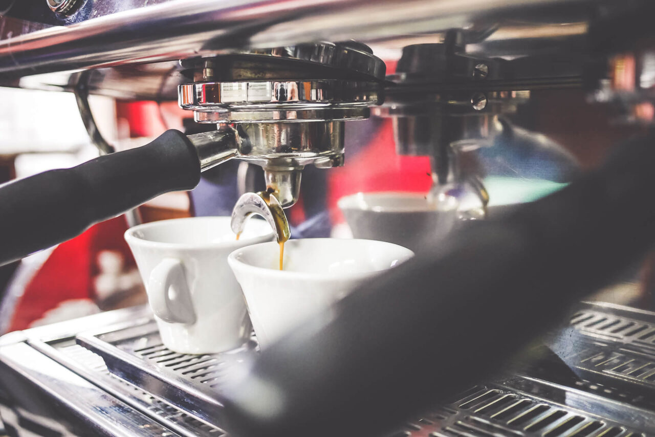 Espresso Machine Making Coffee in Bar